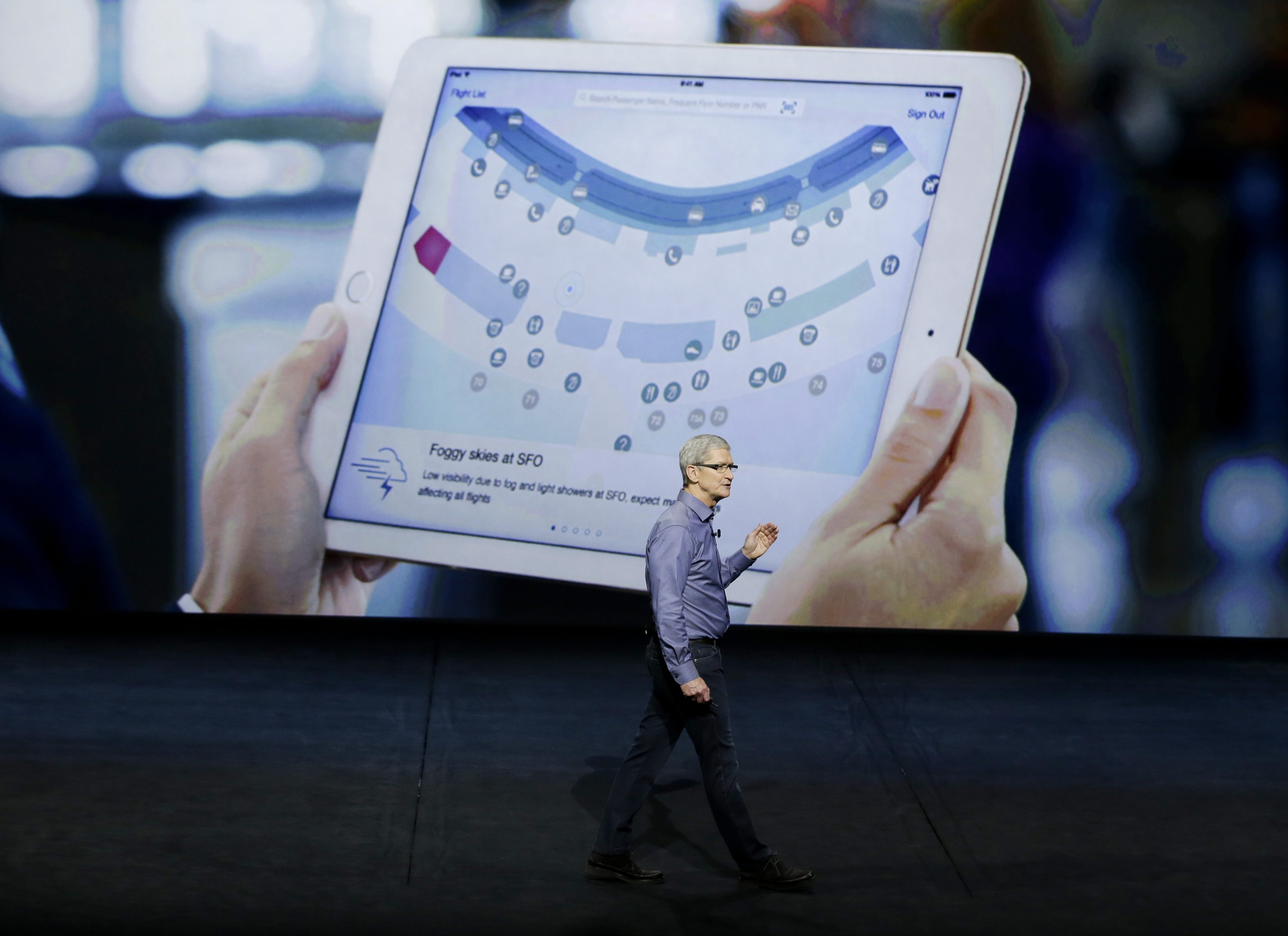 Apple CEO Tim Cook discusses the new iPad during the Apple event at the Bill Graham Civic Auditorium in San Francisco, Wednesday, Sept. 9, 2015. (AP Photo/Eric Risberg)